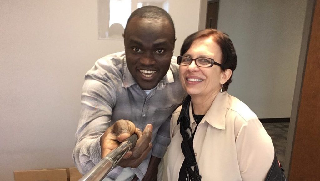 PhD candidate Jimoh Braimoh takes a selfie with Dr. Marting
